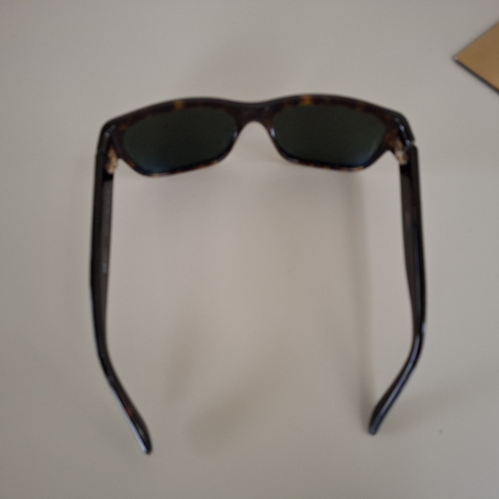 Gucci Tortoise Shell Sunglasses With Dark Lenses